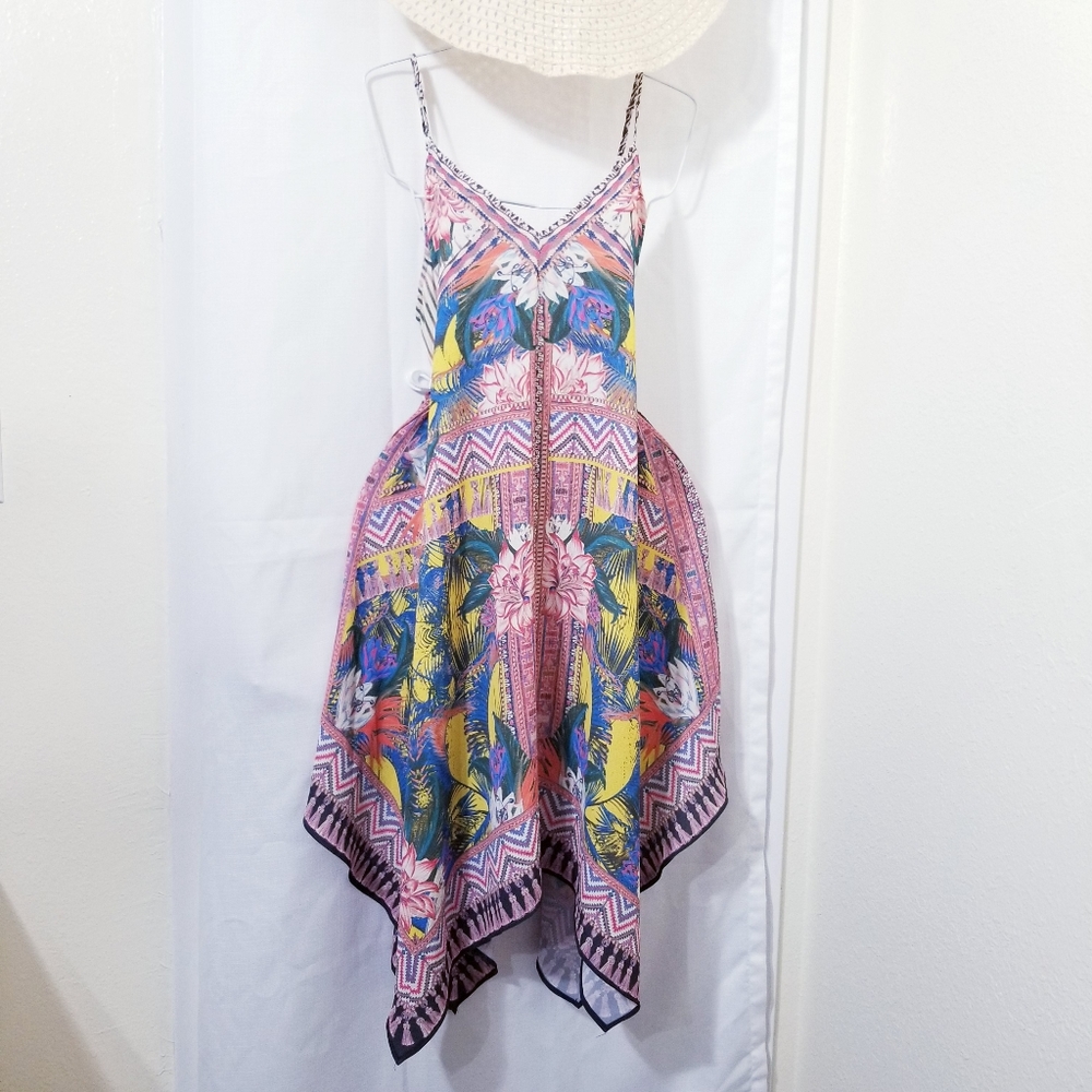 Cute asymmetrical dress, adjustable straps, cool tropical print,v neck,flowy